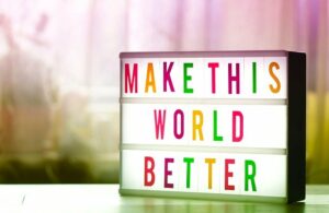 Make this world better sign